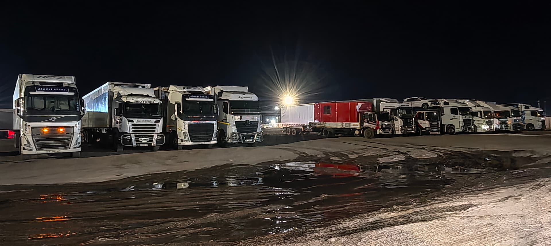 Trucks parked at the hub at night